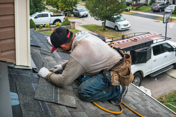 Professional Emergency Roof Repair technician working in Robertsdale, PA